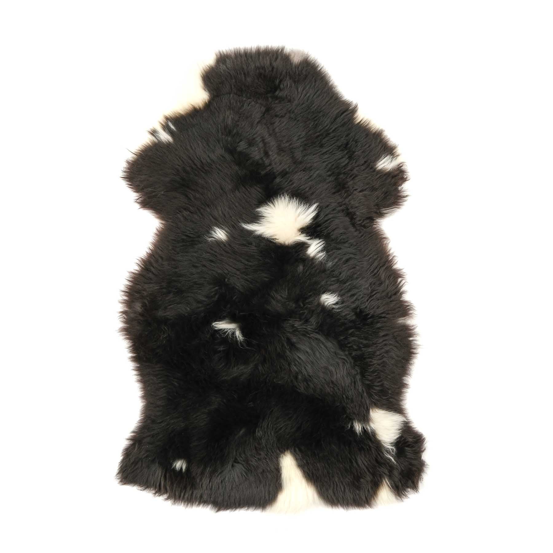 Pelle d'agnello merino a pezze bianco nero