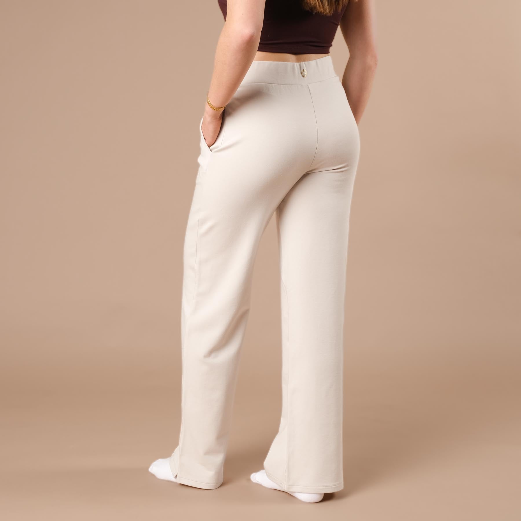 Pantaloni da jogging da donna larghi con bordino color ecru